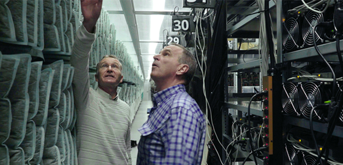 Helmut Rauth and Robert Bryce in a Crypto Datacenter.